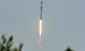 Image Caption: Vapor cone visible around Falcon 9 as it rises faster than the speed of sound.